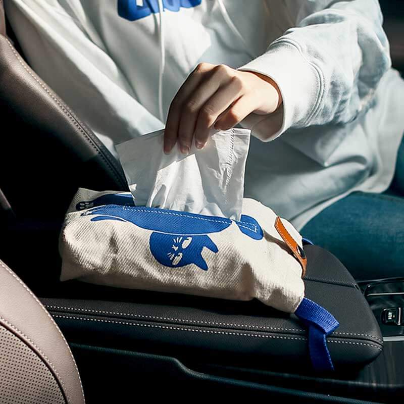 pulling tissue out of napkin holder